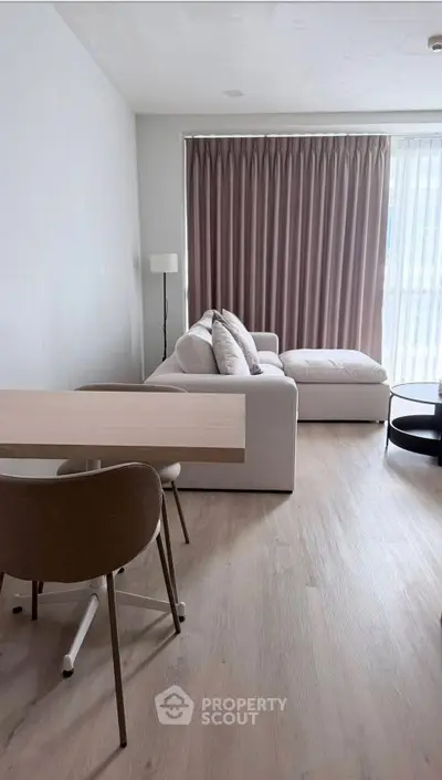 Modern living room with elegant decor and natural light