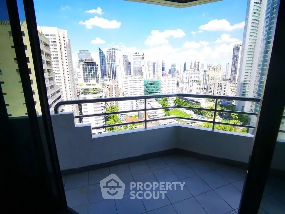 Stunning cityscape view from a high-rise balcony, perfect for urban living enthusiasts.