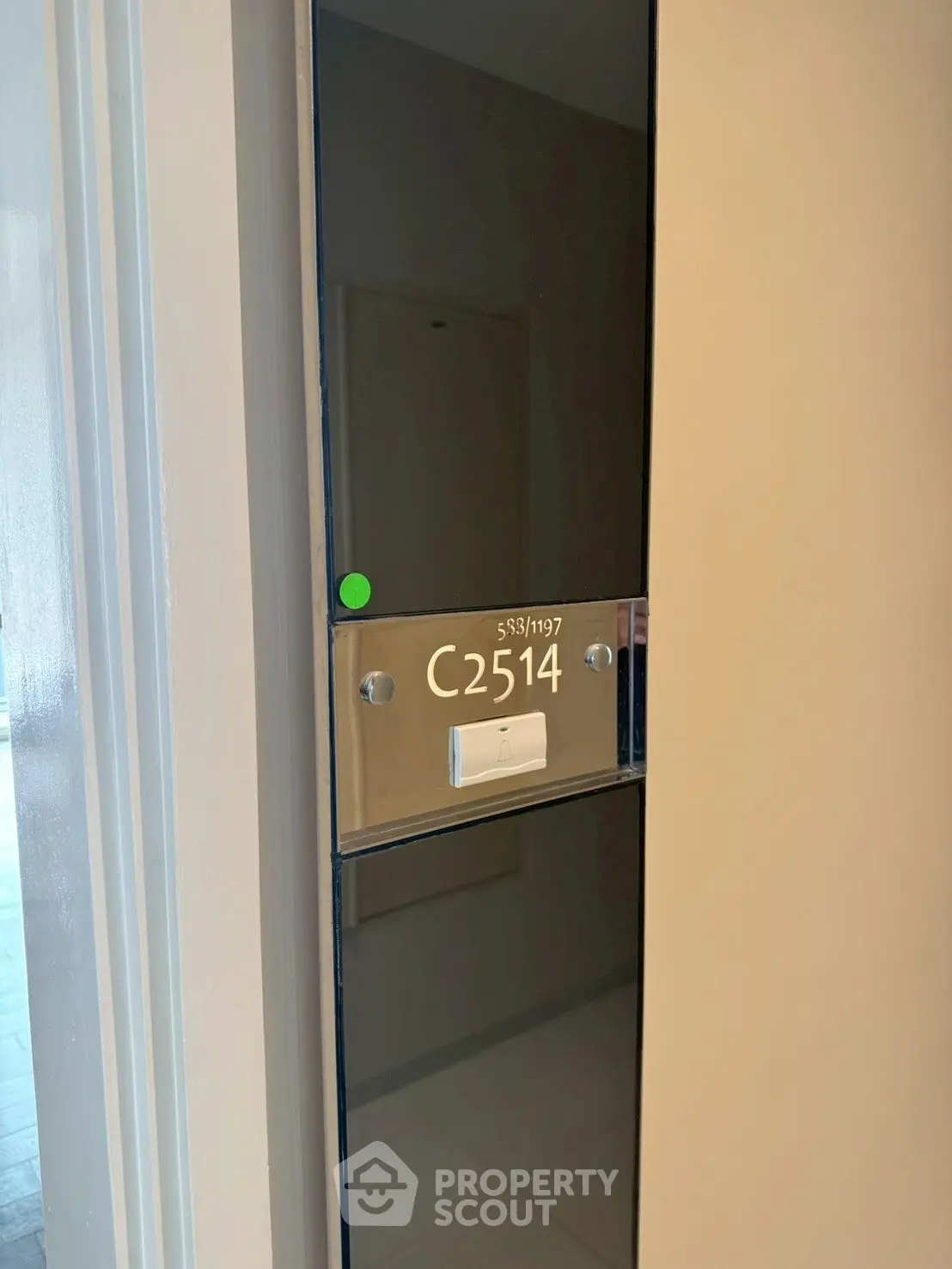 Modern apartment entrance with sleek door design and unit number C2514 displayed prominently.
