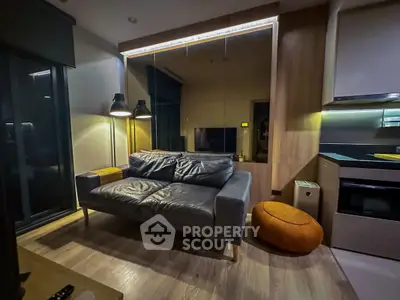 Modern living room with sleek sofa and stylish lighting in cozy apartment