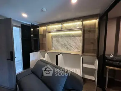 Modern living room with stylish built-in storage and cozy sofa