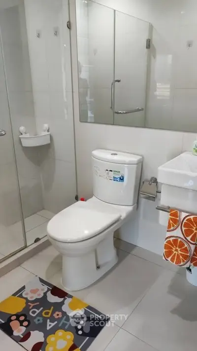 Modern bathroom with glass shower and stylish decor