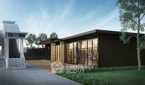 Modern building exterior with sleek design and lush greenery, ideal for commercial or residential use.