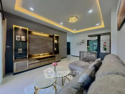 Luxurious living room with modern decor and elegant lighting