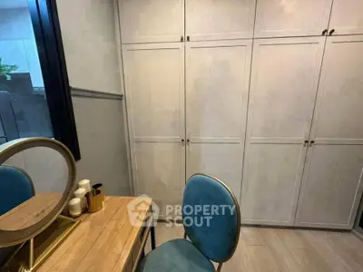 Modern bedroom with stylish vanity and spacious wardrobe