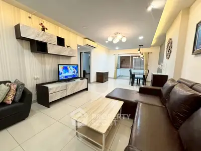 Spacious modern living room with elegant decor and open dining area