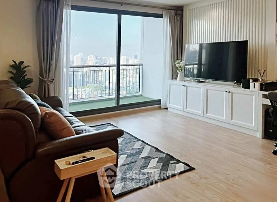 Spacious living room with city view and modern decor
