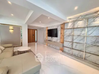 Luxurious modern living room with marble accents and elegant lighting