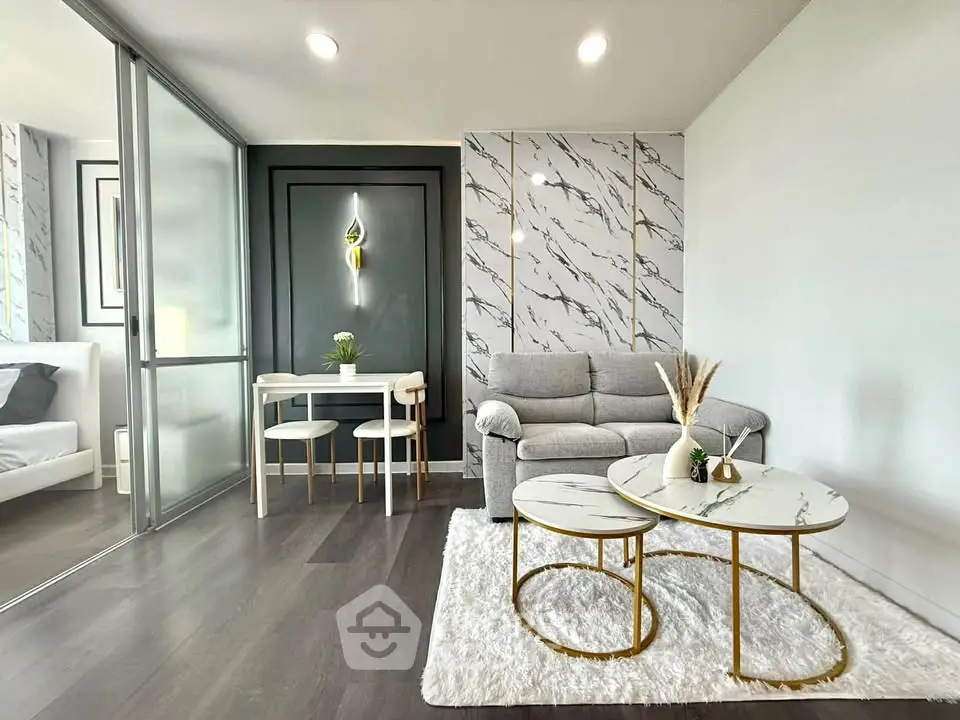 Modern living room with marble accents and stylish furniture