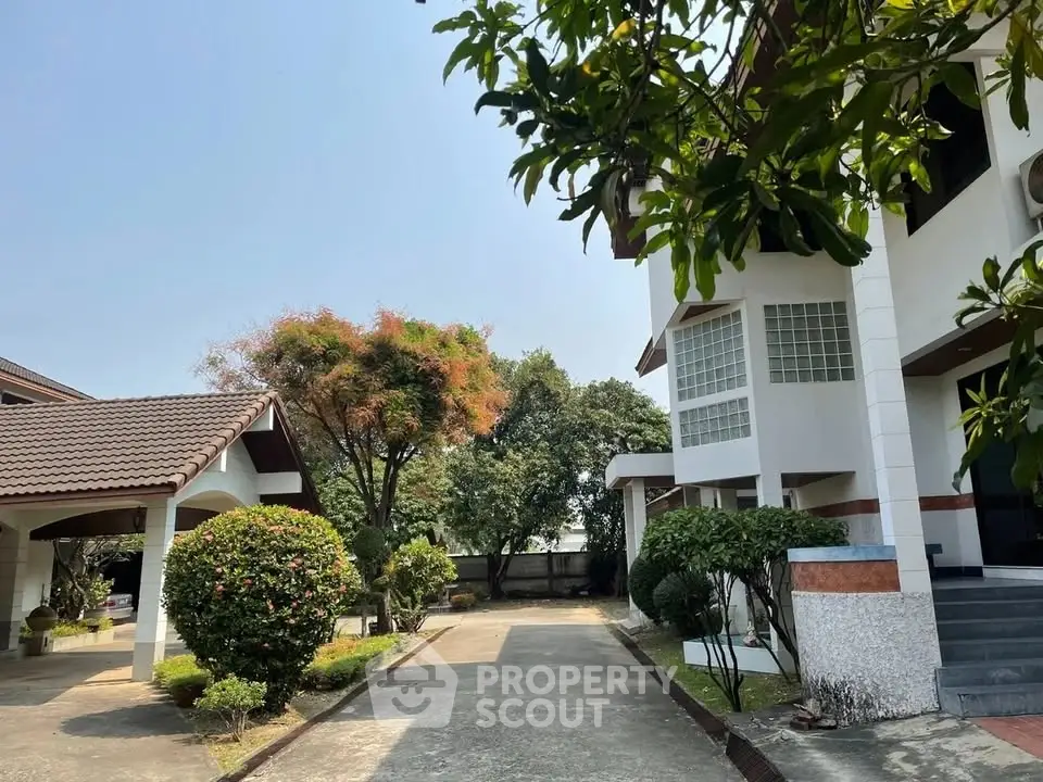 Charming suburban home with lush garden and spacious driveway, perfect for family living.