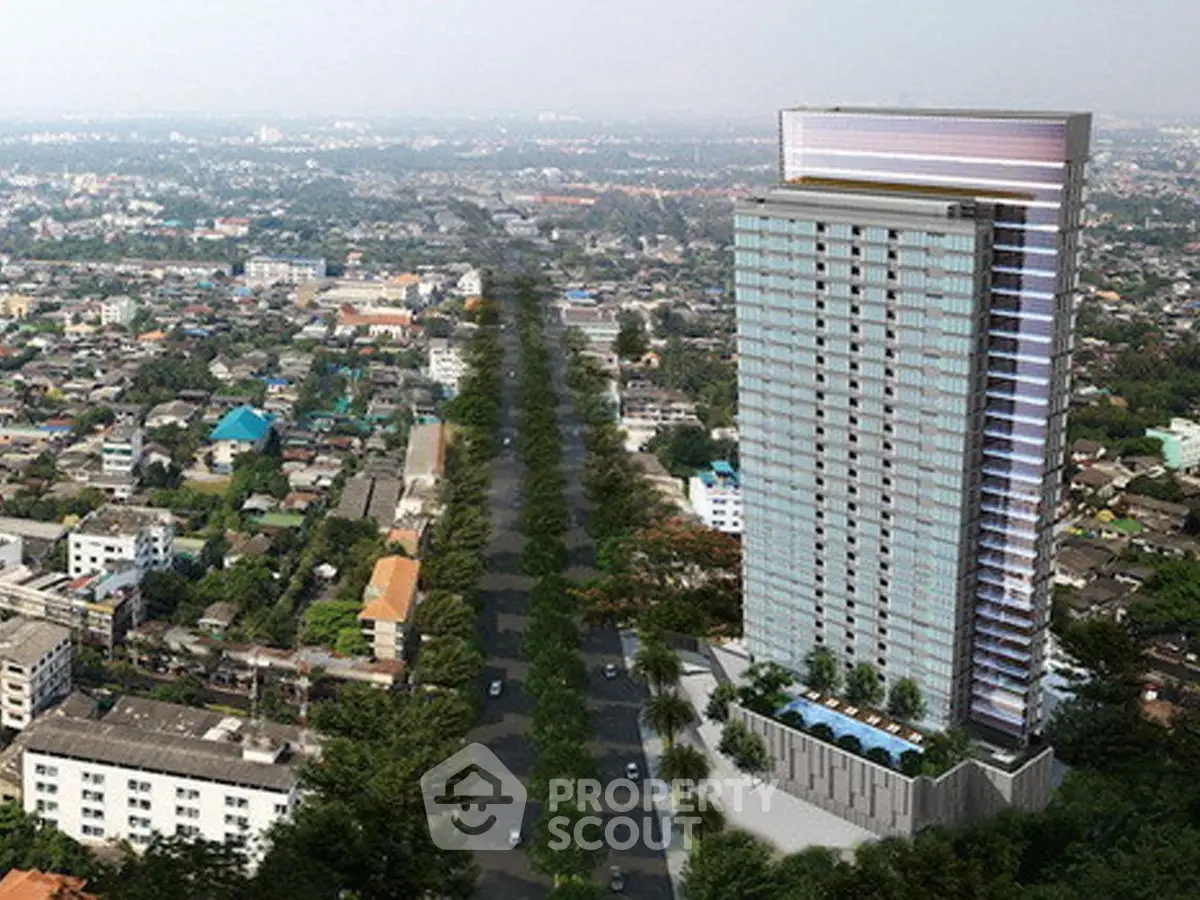 Stunning aerial view of modern high-rise building with panoramic cityscape backdrop.