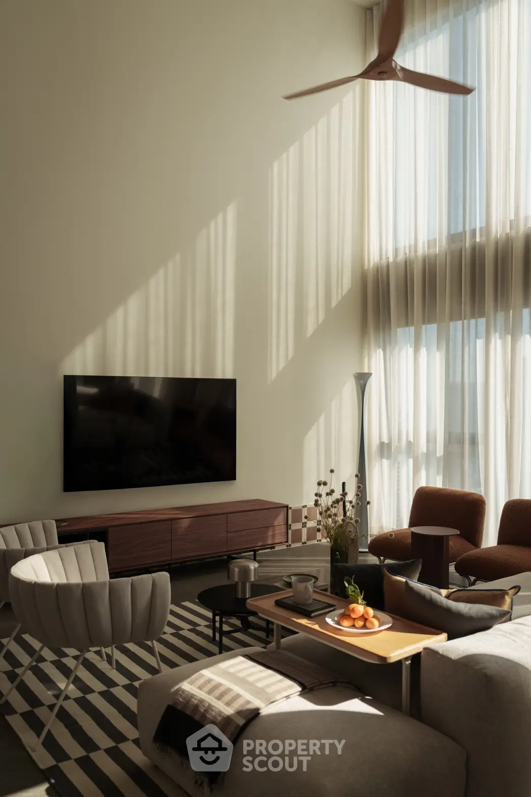 Luxurious modern living room with high ceilings and elegant decor