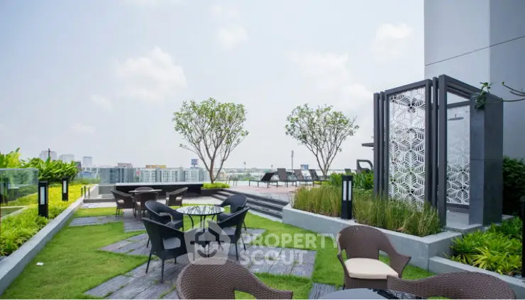 Stunning rooftop garden with seating and city views, perfect for relaxation and gatherings.