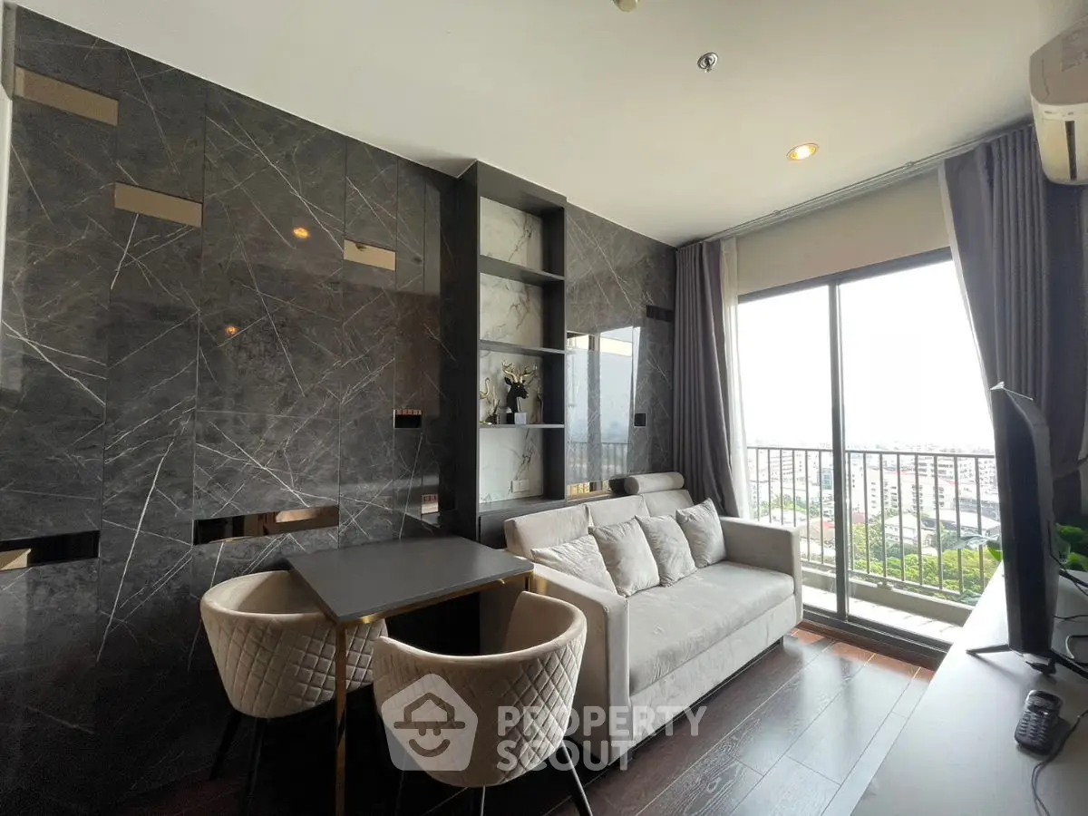 Modern living room with marble accent wall and city view balcony