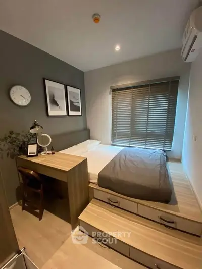 Cozy modern bedroom with stylish decor and natural light
