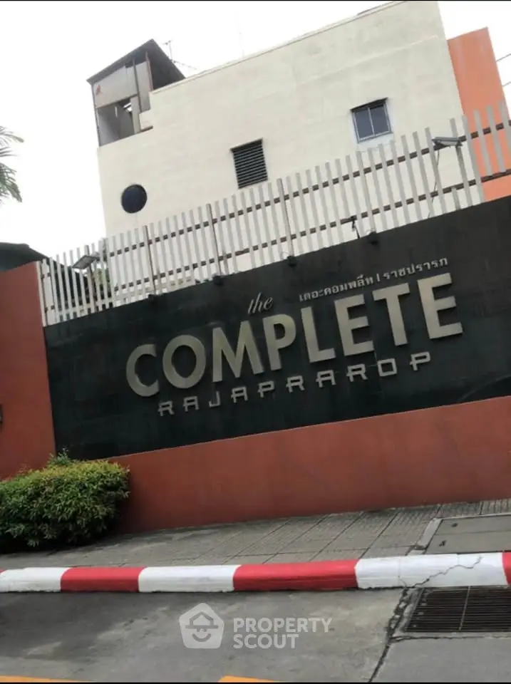 Modern building exterior with stylish signage at The Complete Rajaprarop.