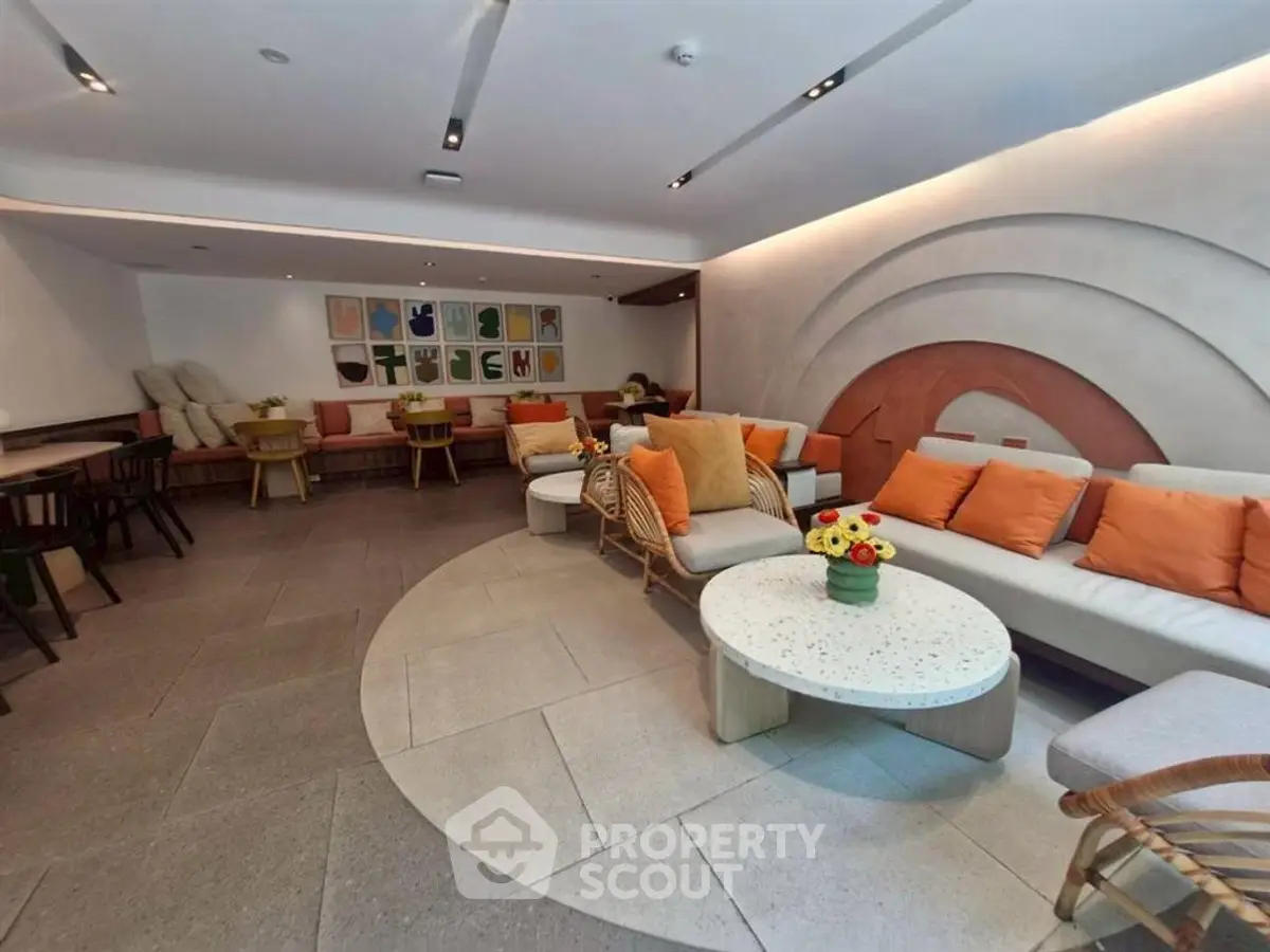 Stylish modern living room with vibrant decor and unique wall design