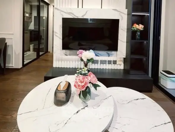 Modern living room with marble accents and elegant decor