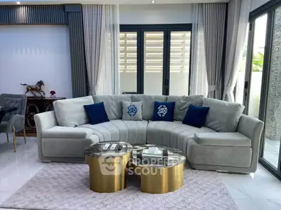 Luxurious living room with elegant sofa and stylish coffee tables