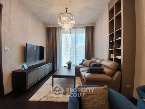 Luxurious living room with elegant chandelier and modern decor