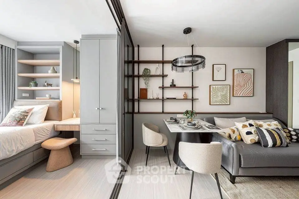 Modern living room with stylish decor and cozy seating area in a contemporary apartment.