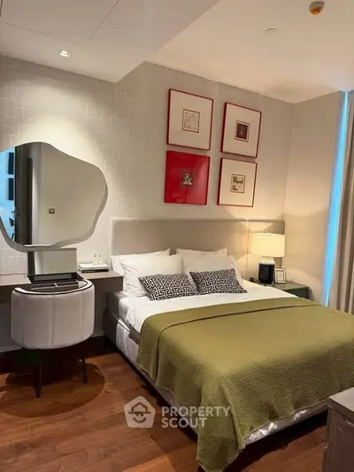 Luxurious bedroom with modern decor and stylish furnishings in a high-end apartment.