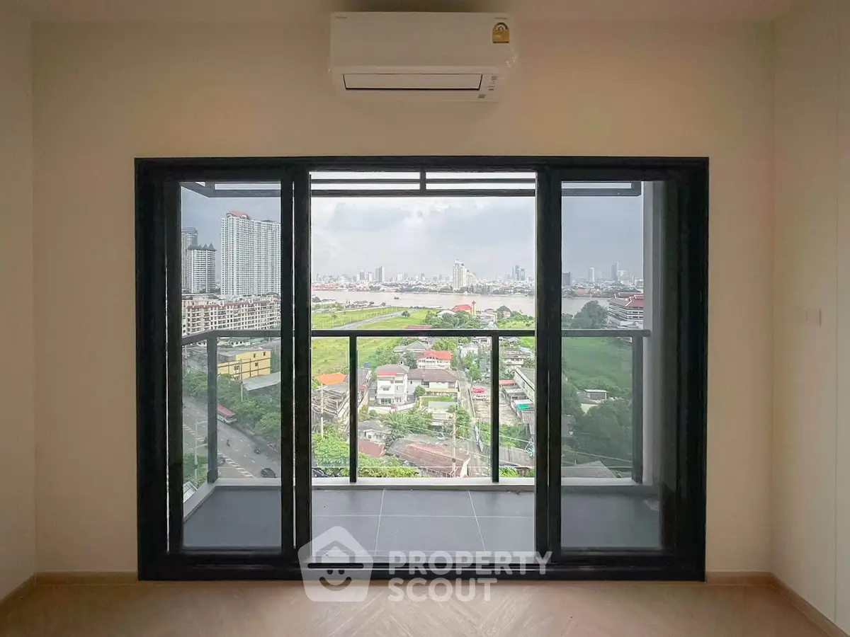 Spacious apartment with stunning city and river view from large balcony.