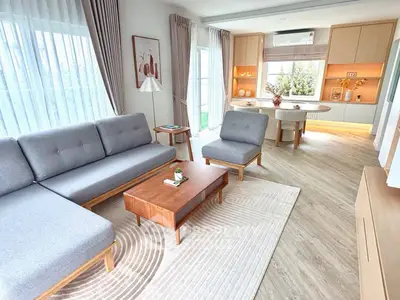 Modern living room with stylish furniture and natural light