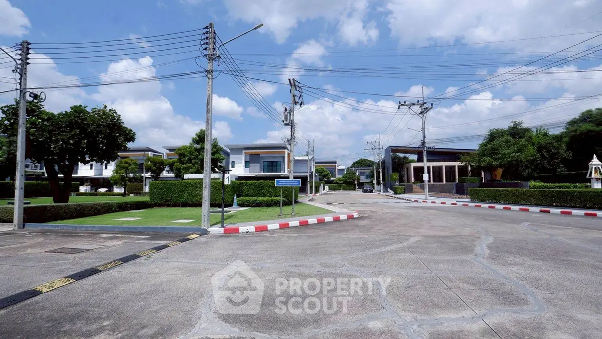 Charming suburban neighborhood with modern homes and lush greenery