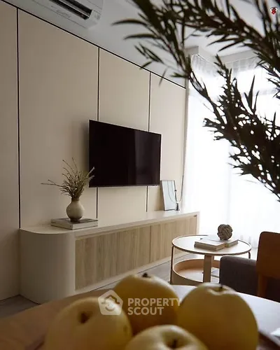 Modern living room with sleek TV setup and stylish decor