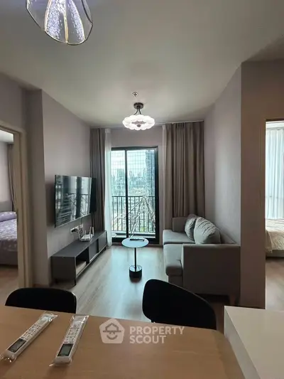 Modern living room with balcony view in stylish apartment