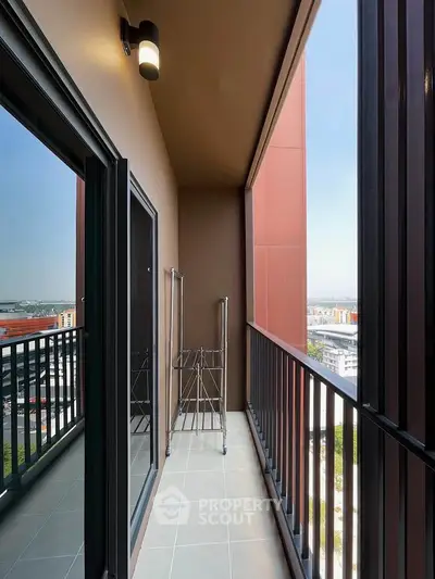 Modern balcony with city view and sleek railing design