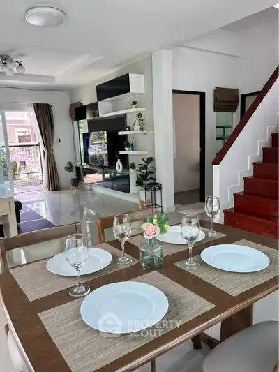 Stylish modern living room with dining area and elegant decor