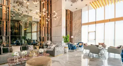 Luxurious modern living room with high ceilings and elegant decor