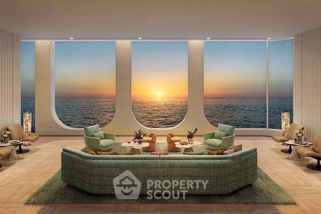 Luxurious living room with panoramic ocean view and elegant furnishings.