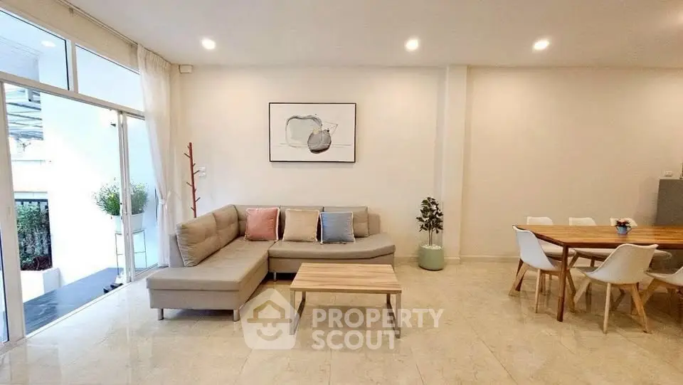 Spacious modern living room with elegant decor and natural light