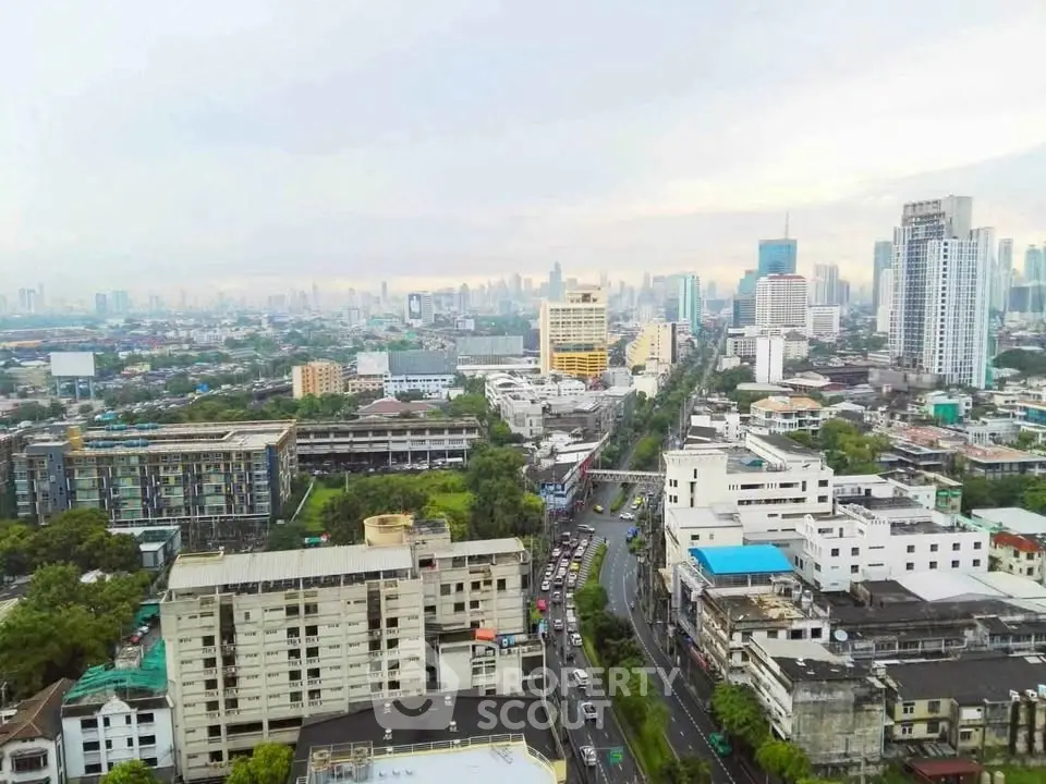 Stunning aerial view of a bustling cityscape with diverse architecture and vibrant urban life.