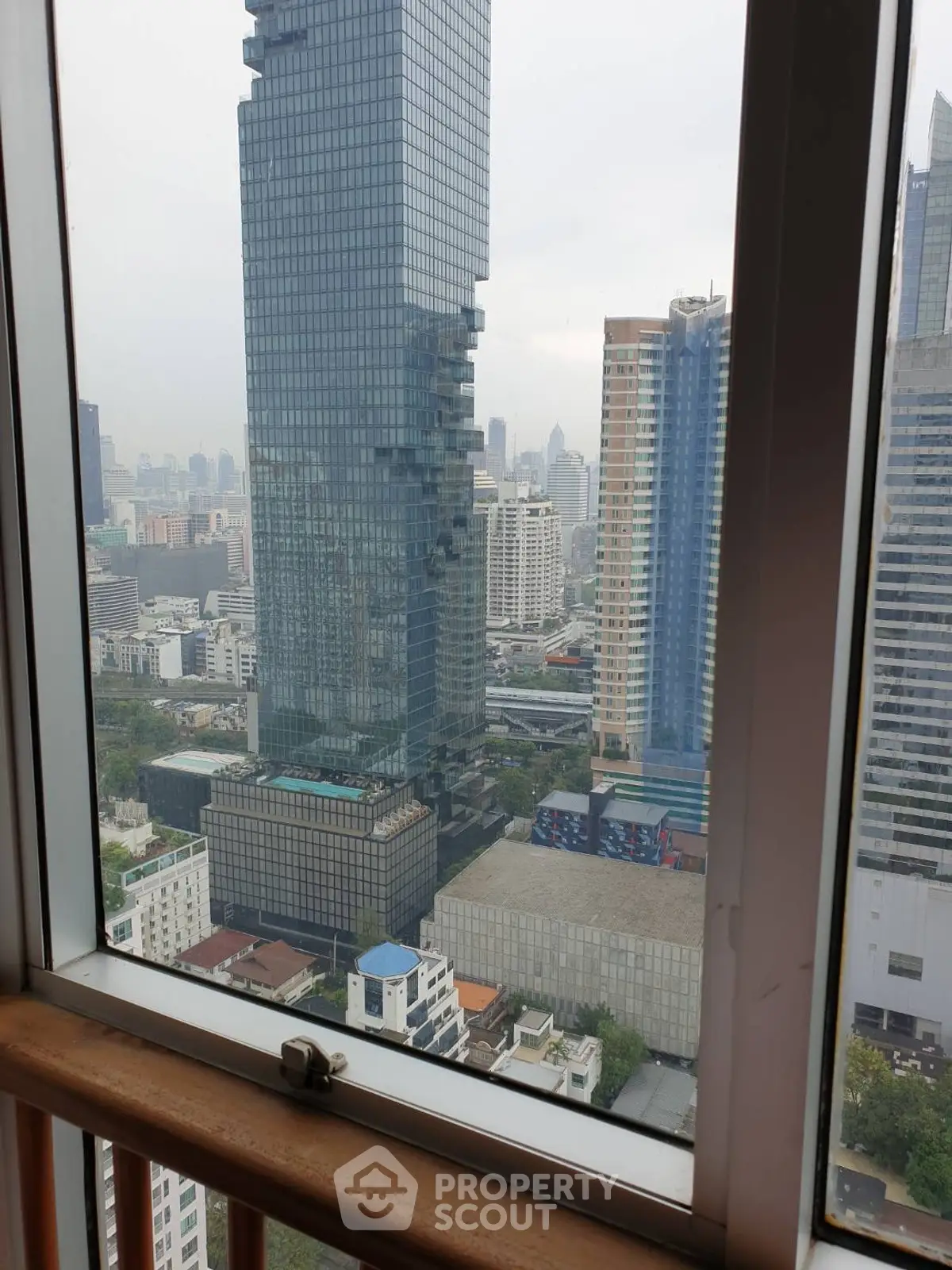 Stunning cityscape view from high-rise apartment window