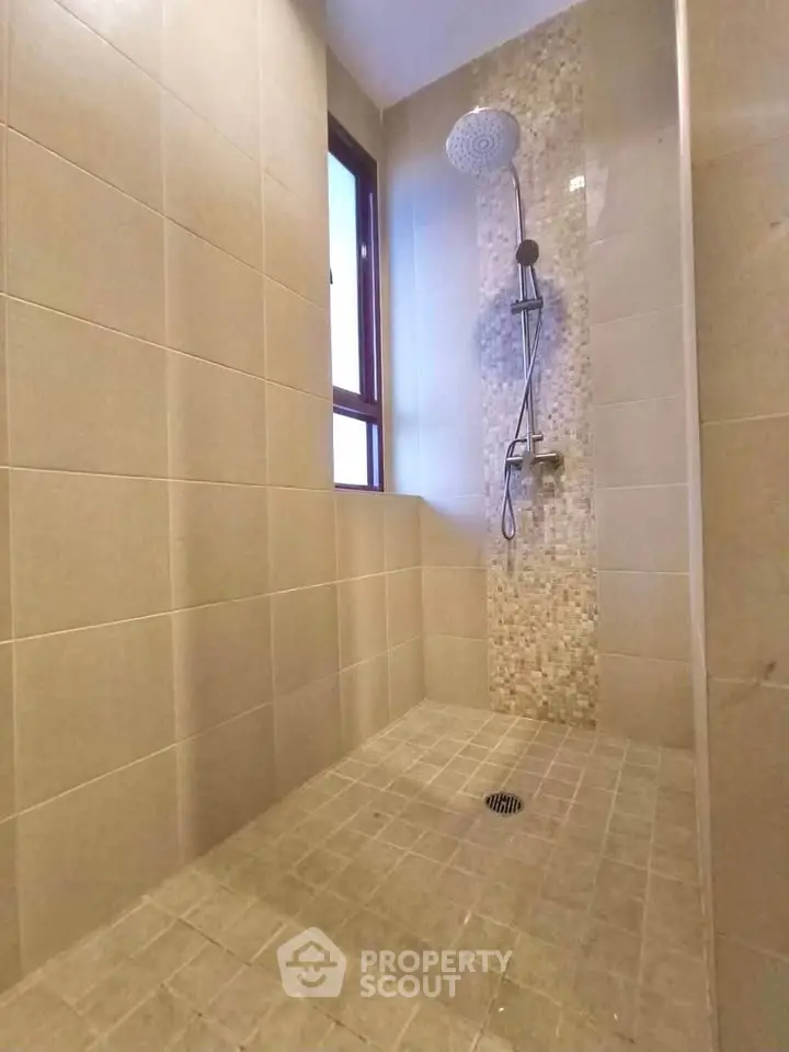 Modern bathroom with walk-in shower and stylish tile design