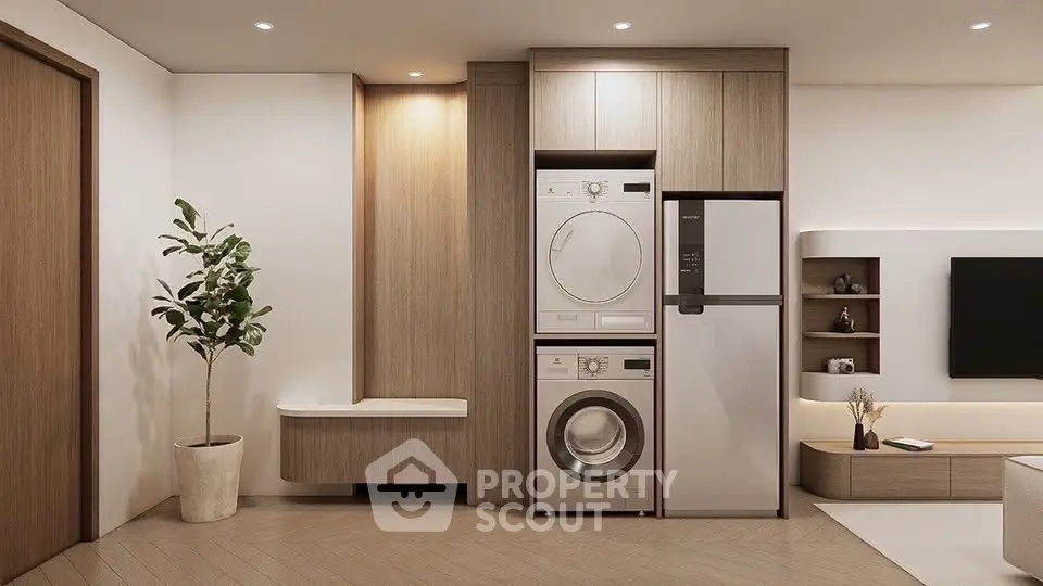 Modern living room with built-in laundry appliances and stylish decor