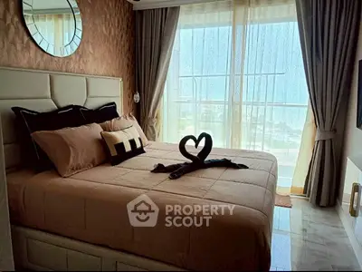 Luxurious bedroom with elegant decor and large window view