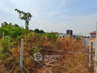 Spacious land plot with potential for development, featuring clear boundaries and natural surroundings.