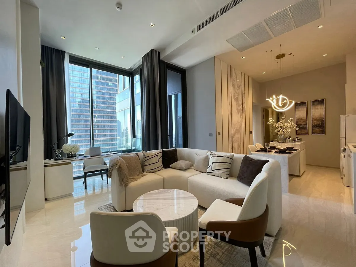 Luxurious modern living room with open kitchen and city view