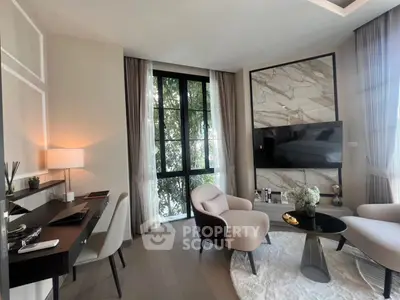 Luxurious modern living room with elegant decor and large windows