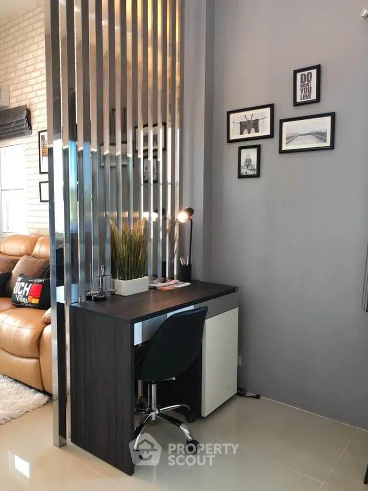 Modern study nook with sleek desk and stylish decor in cozy apartment
