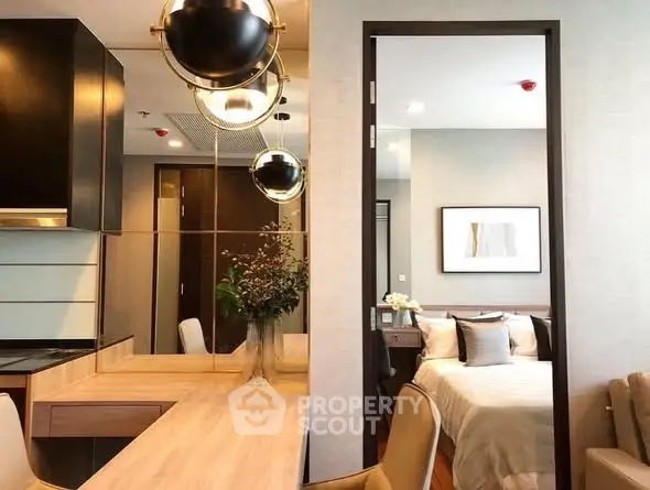 Modern apartment interior with stylish kitchen and cozy bedroom view.