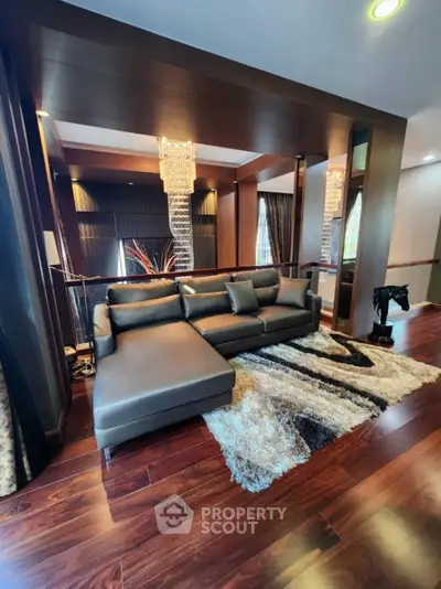 Luxurious living room with elegant decor and plush seating in a modern home.