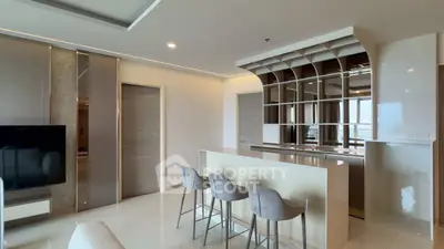 Luxurious modern living room with sleek bar area and stylish decor
