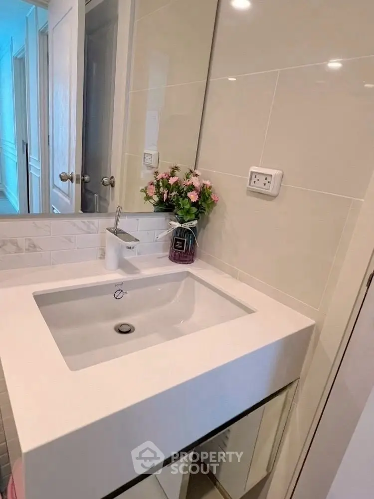Modern bathroom with sleek sink and elegant decor