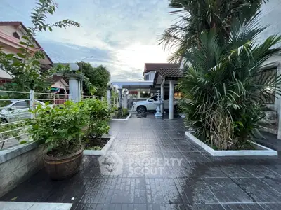 Charming suburban home with lush garden and spacious driveway, perfect for family living.